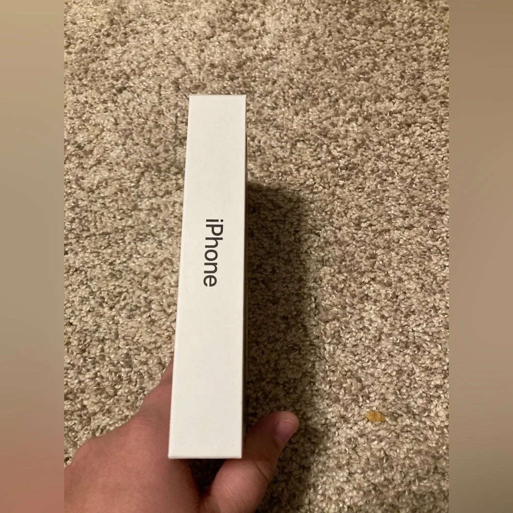 Apple iPhone SE black 64GB product box and instructions